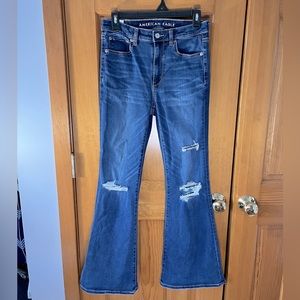 American Eagles Size 6 Dark denim Super Hi-rise Flare ripped jeans